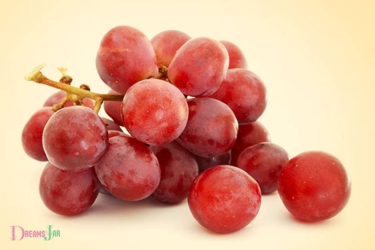 eating red grapes in dream meaning